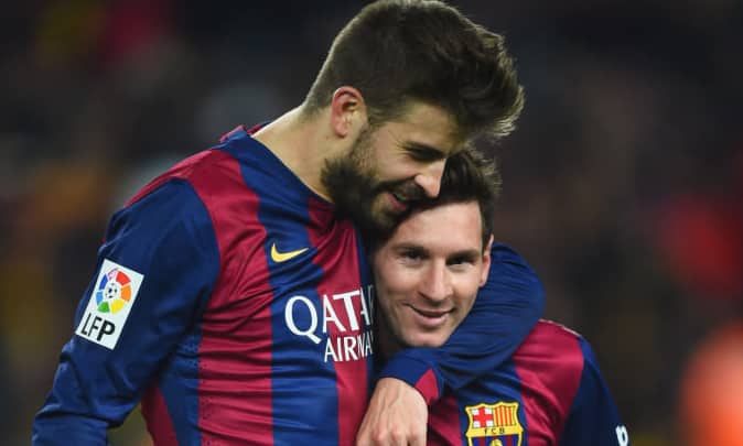 Gerard Piqué y Leo Messi en un partido del Barça