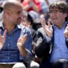Pep Guardiola y Carles Puigdemont en un acto independnetista