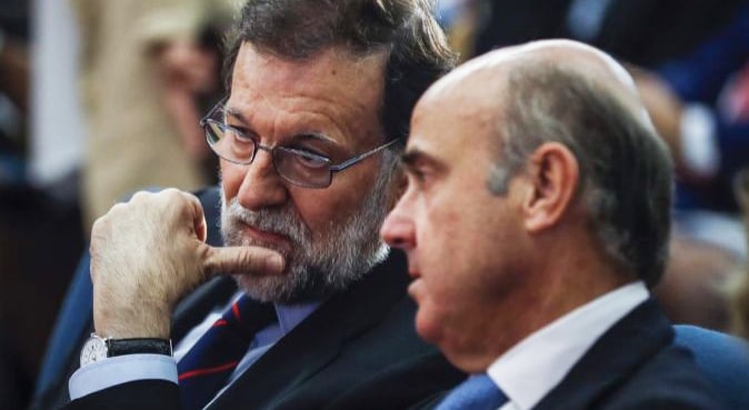 Mariano Rajoy y Luis de Guindos