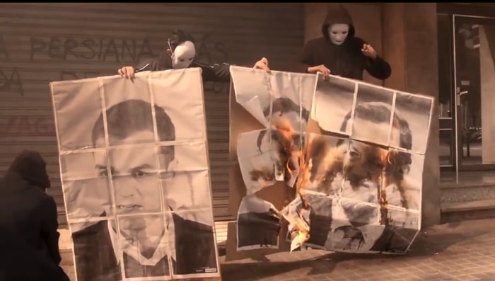 Arran quema fotos de Rajoy, Sánchez y Rivera