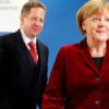 Hans-Georg Maasen y Angela Merkel