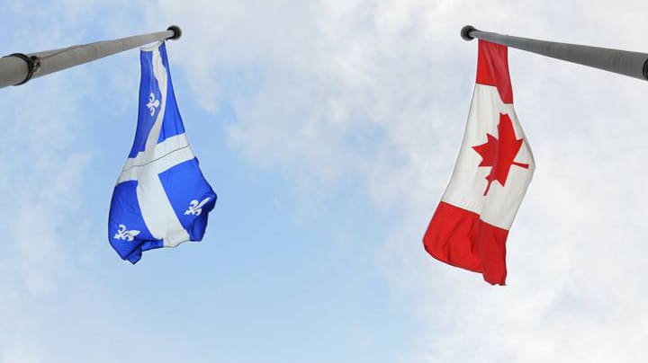 Banderas de Quebec y Canadá