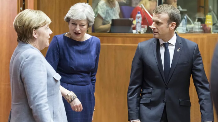 Angela Merkel, Theresa May y Emmanuel Macron